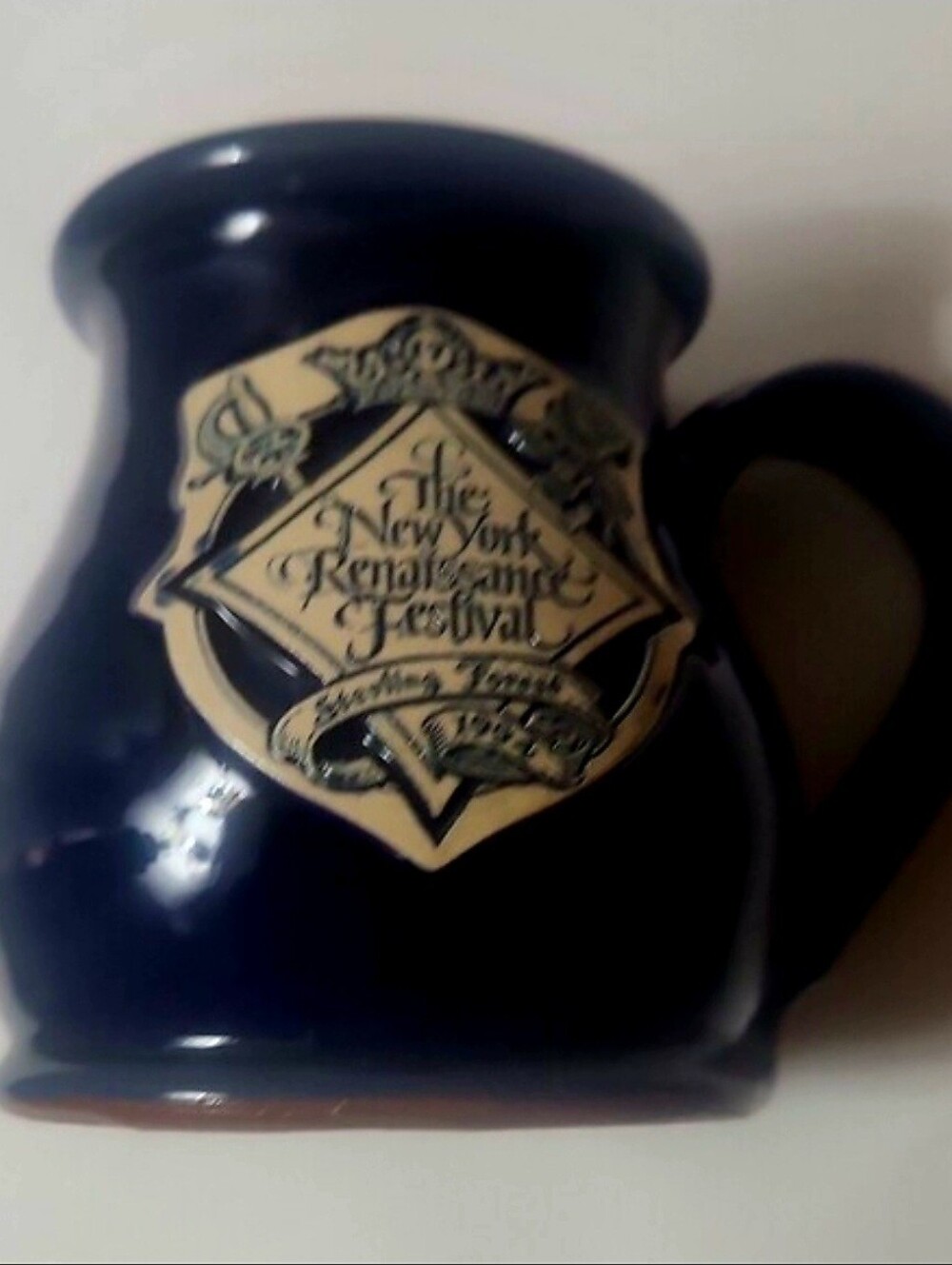 Vintage blue stoneware collectible mug from The New York Renaissance Festival in